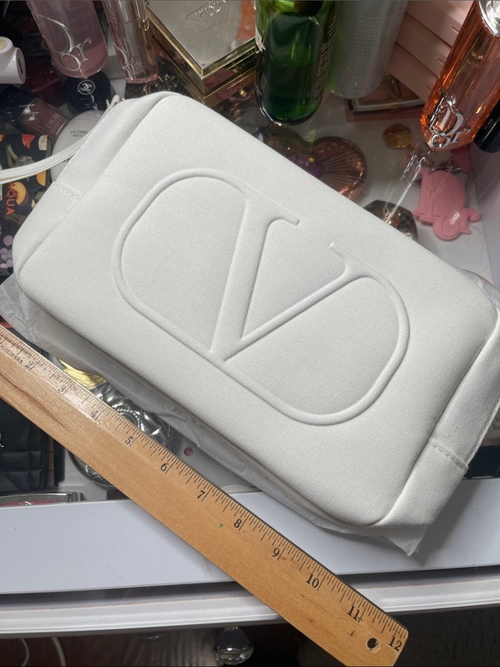 Valentino Handbags - Valentino ivory cosmetic case pouch brand new